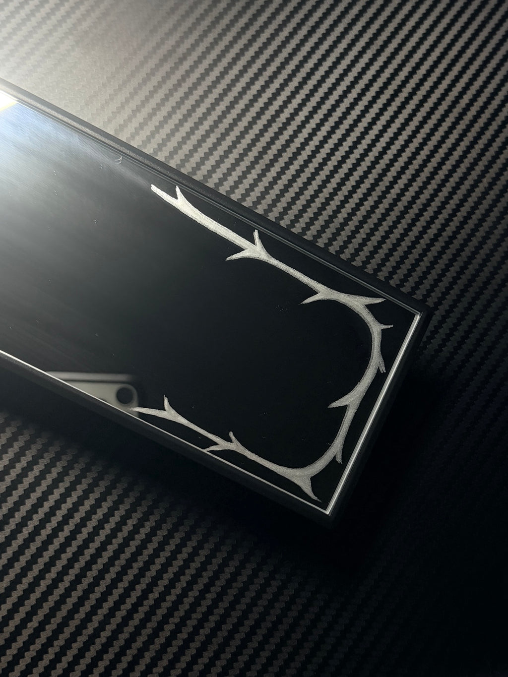 Thorn border engraving detail