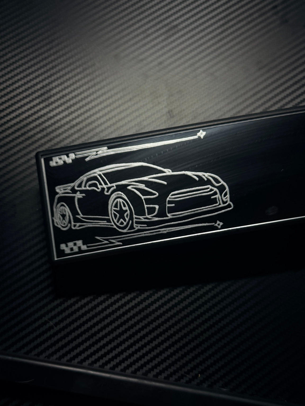GT-R car engraving close-up
